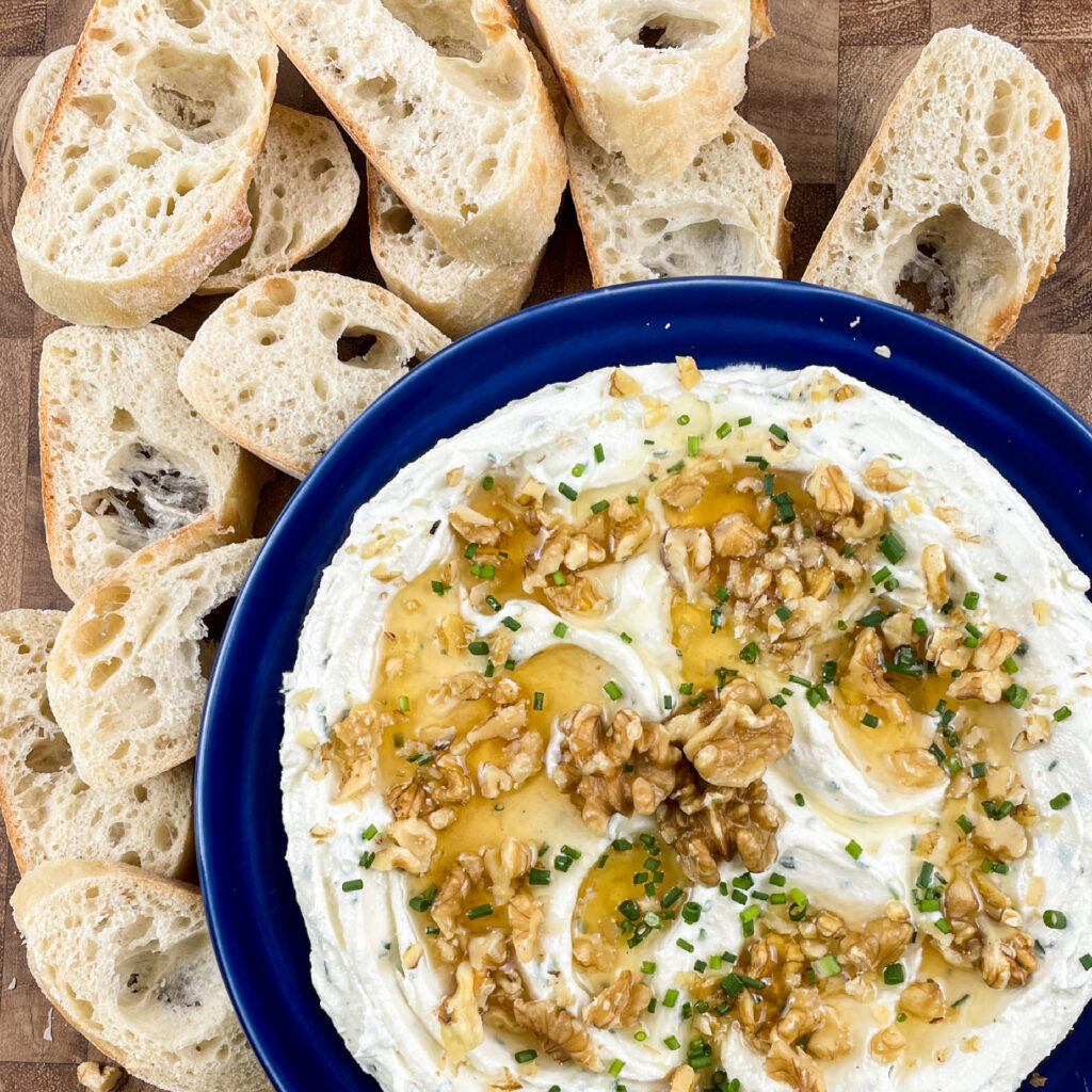 Whipped feta with honey and walnuts with bread for dipping