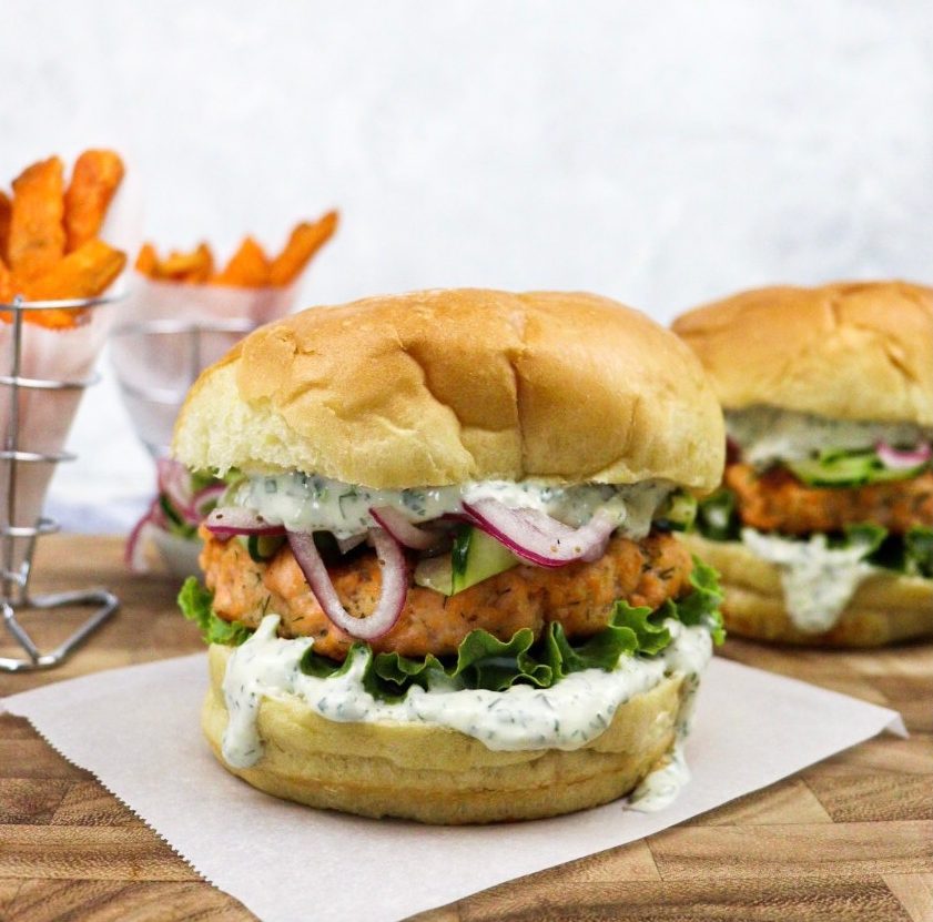 Two salmon burgers with yam fries