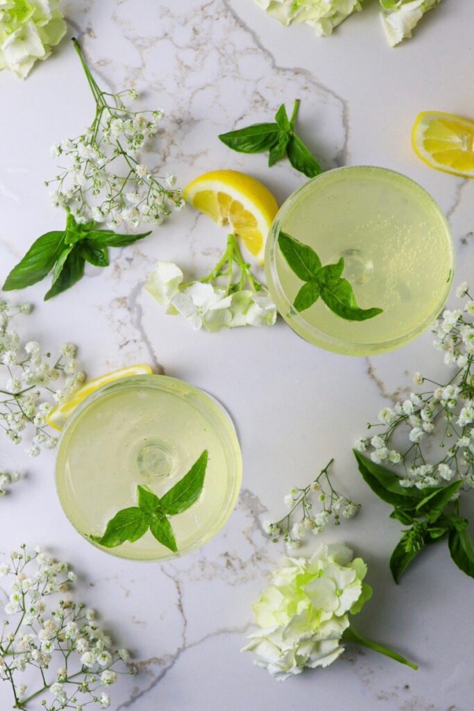 Two glasses of limoncello basil cocktail