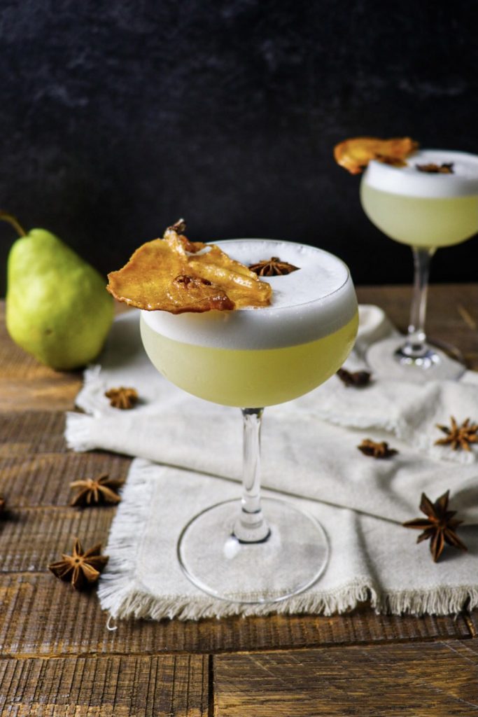 Two gin cocktails with spiced pear