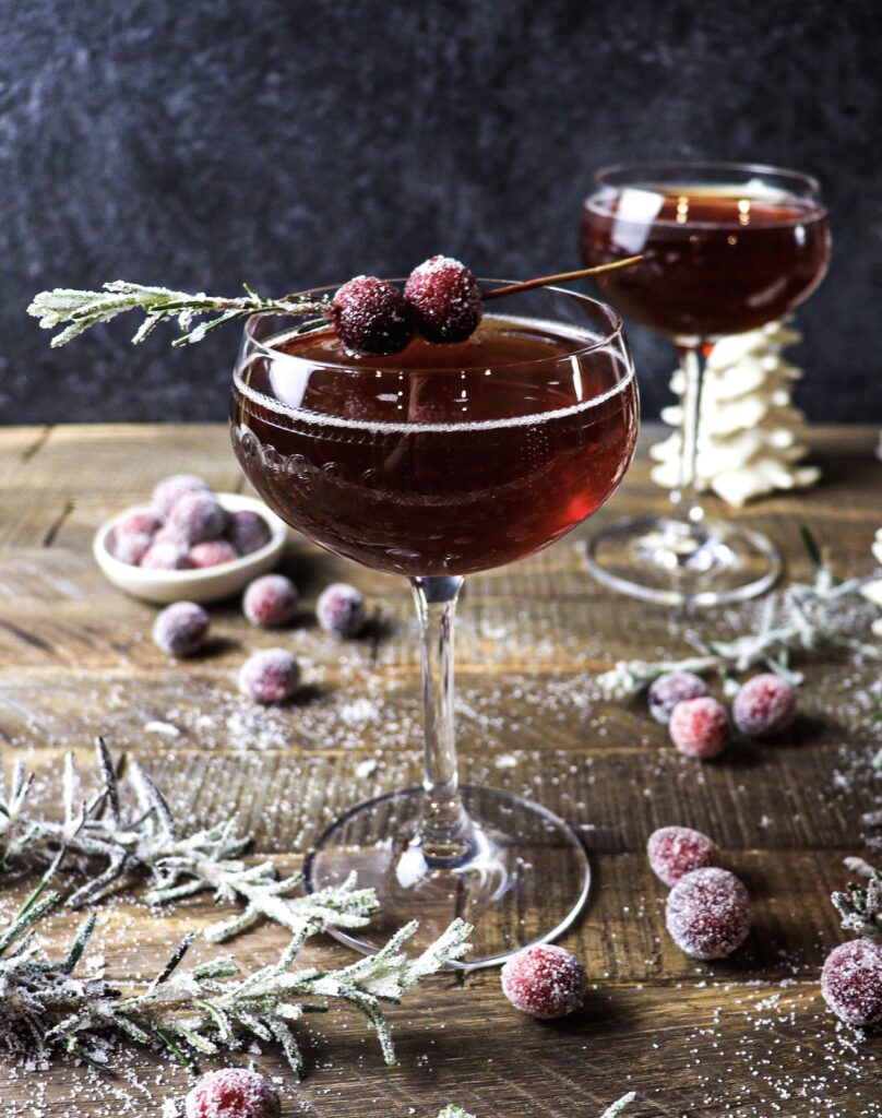 Christmas cocktail with sugared cranberries