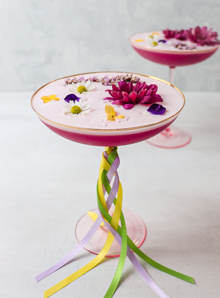 floral cocktail with lavender infused gin and hibiscus rose syrup