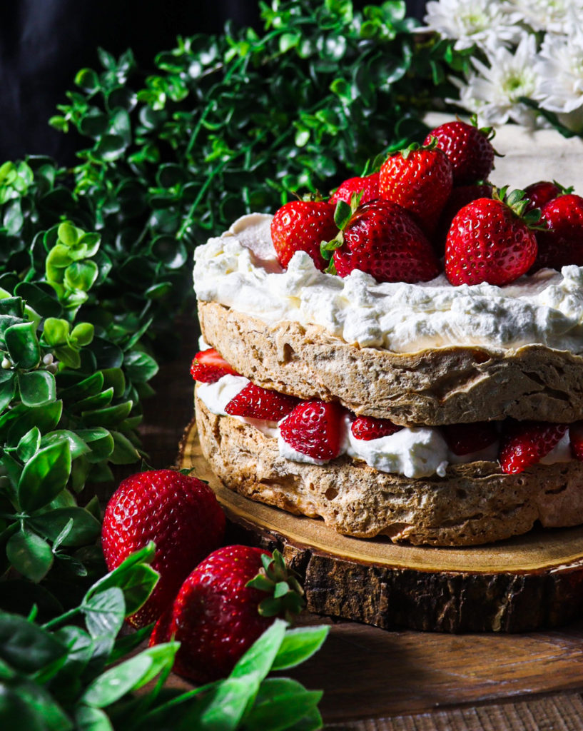 hazelnut meringue cake with strawberries and cream
